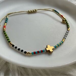 One string bead cross bracelet